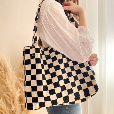 Checkerboard tuck-top tote